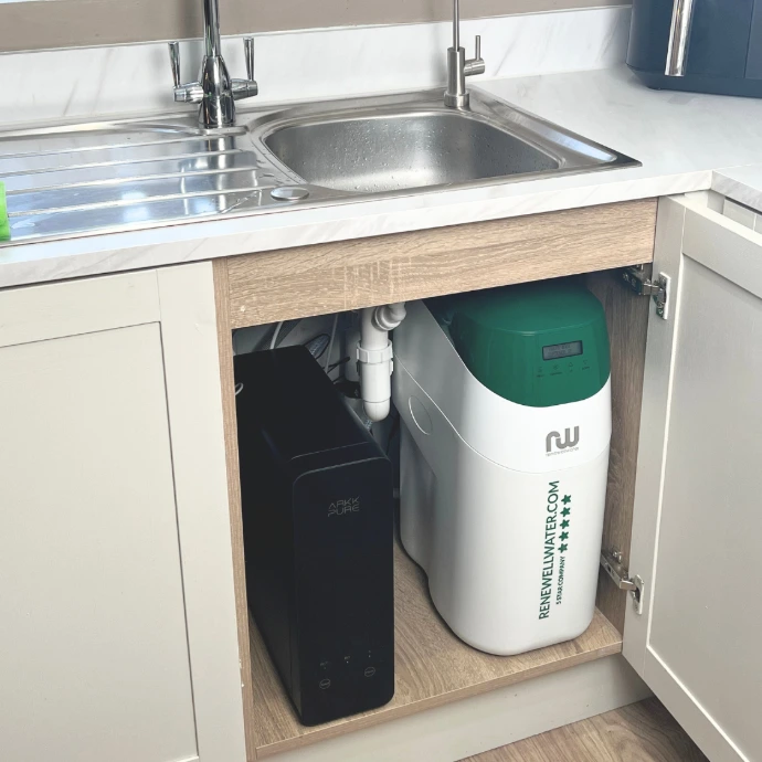 green water softener under the sink