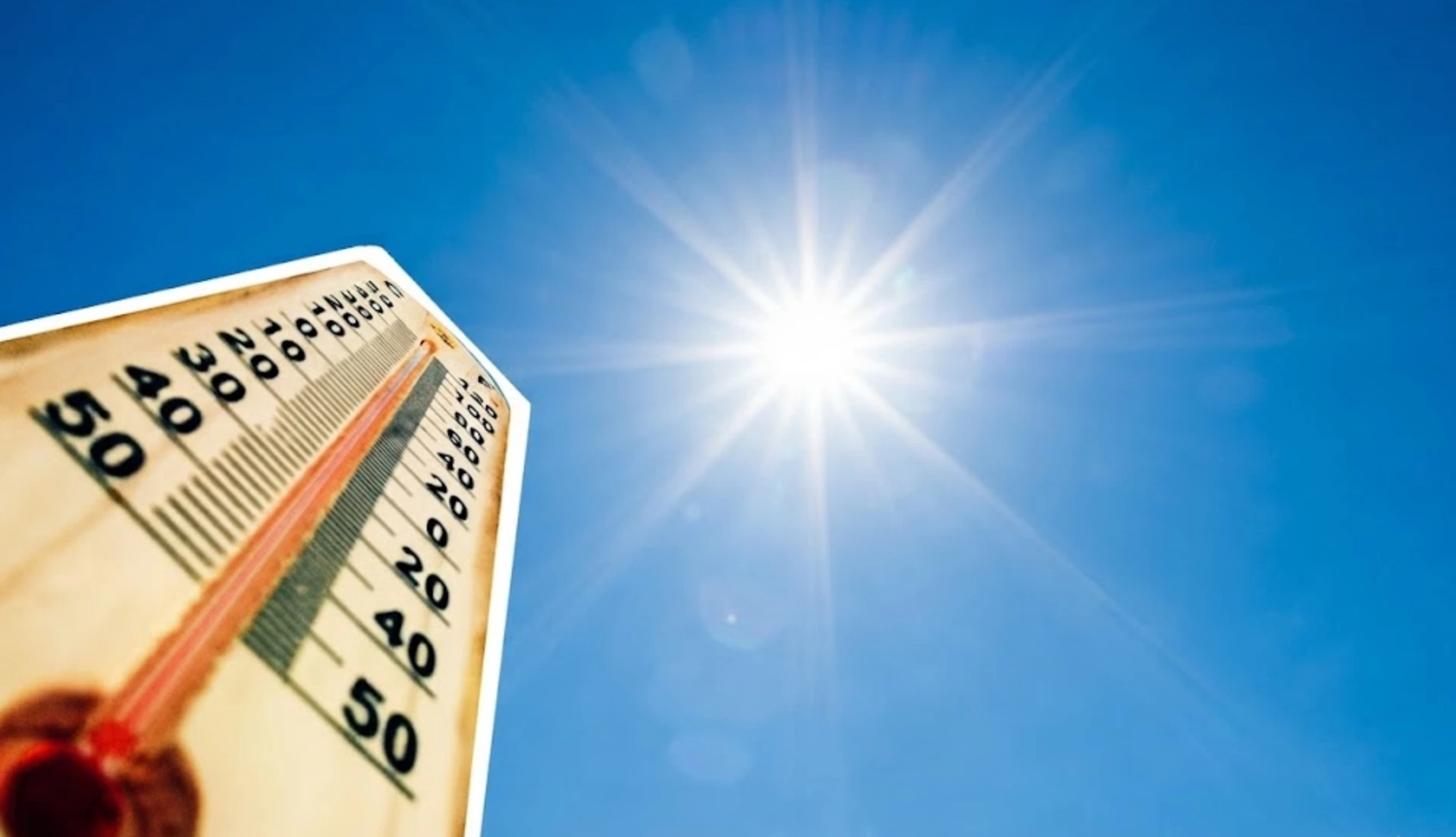 High temperatures during summer Termometer showing high temperatures during summer